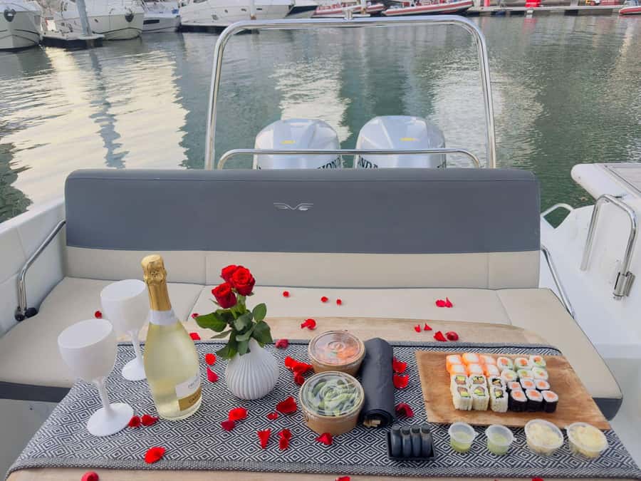 2-Hrs Private Romantic Sunset Cruise with Sushi and Drinks - Dubai at sunset, from marina towers to glowing bridges