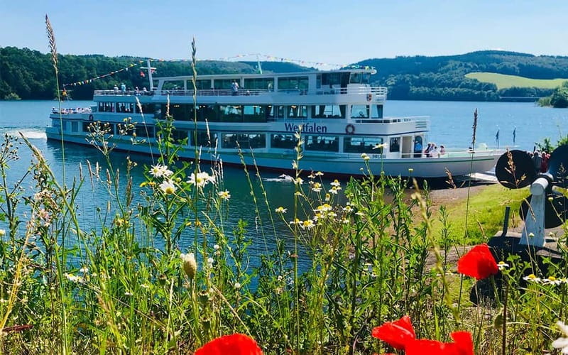Boat trip on the Biggesee: lake romance in the Sauerland mountains! - Biggesee from the water, not the roadside