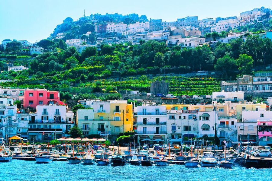 Capri: Private Island Boat Tour for Couples - Leaving Marina Grande on a wooden boat