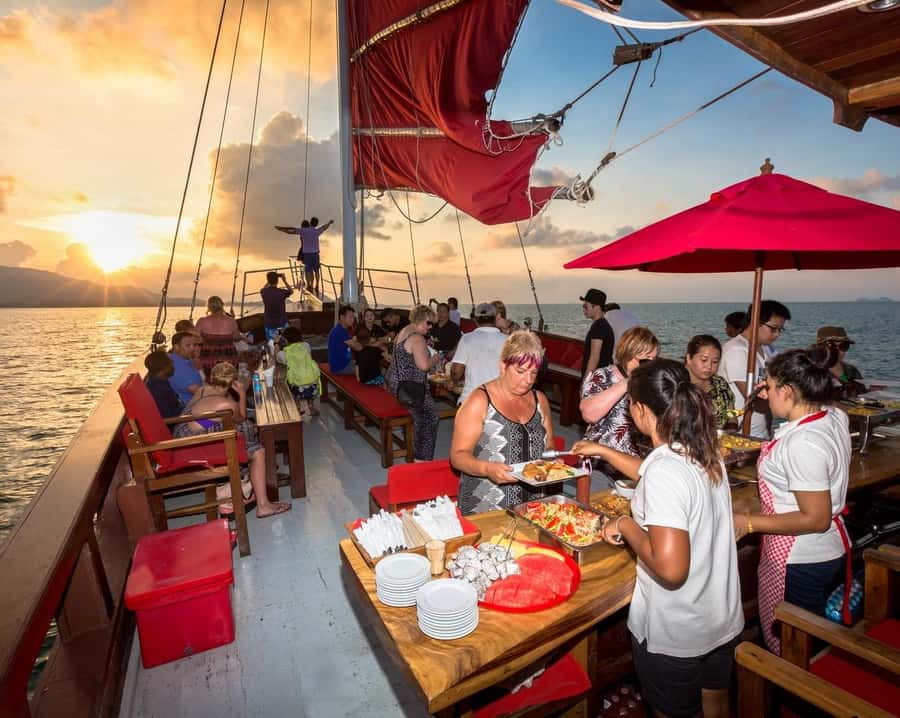 Koh Samui: Red Baron Romantic Sunset Dinner Cruise - The onboard host and language support