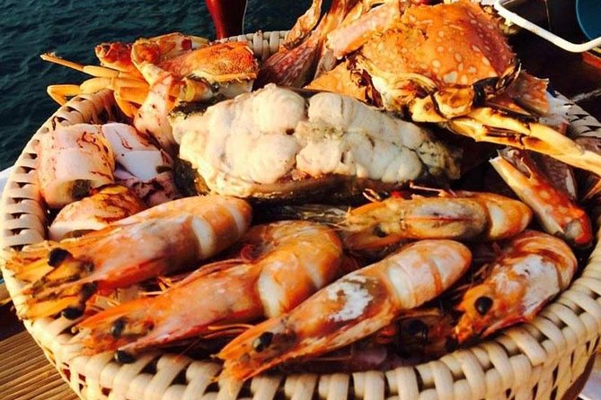 Krabi Romantic Sunset Cruise with BBQ Seafood Dinner by Krabi Sea Cruise - Railay turns dinner into the main event