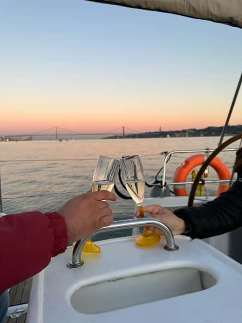 Lisbon: Romantic Cruise with Wine & Portuguese Tapas - Time Out Market, Ribeira das Naus, and Praça do Comércio