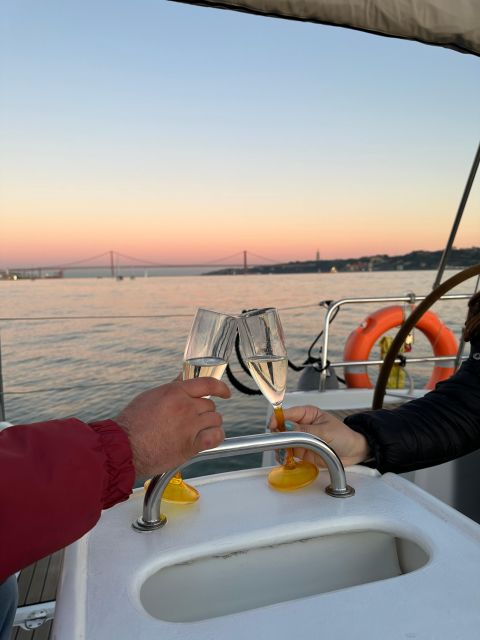 Lisbon: Romantic Cruise with Wine & Portuguese Tapas - What the crew adds to the experience