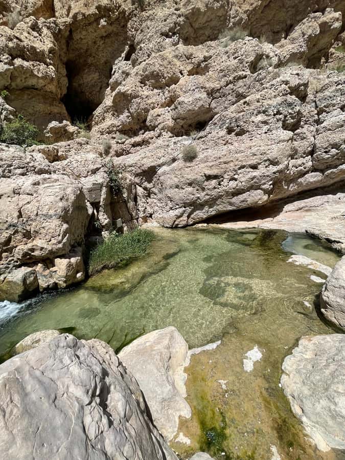 Muscat: Wadi Shab, Romantic Cave and Sinkhole Full-day Trip - What to bring for the rocky route