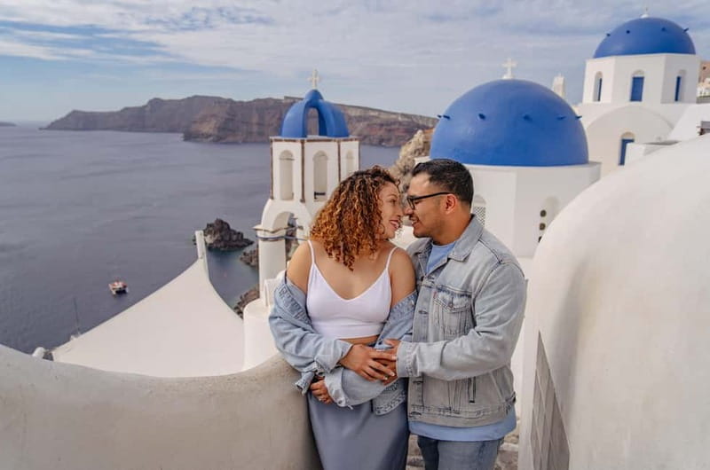 Oia: Couple Photoshoot Seprate Entrance to Blue Dome - Oia’s blue domes and the photo-stop route