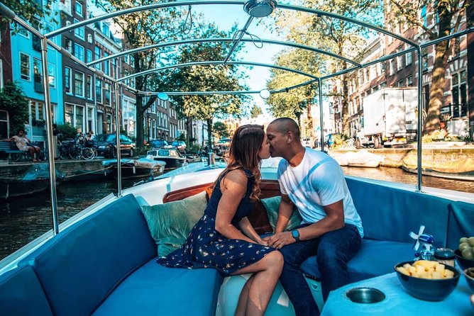 Private Romantic Canal Cruise Amsterdam with Bubbly and Snacks - Bridges, love stories, and Monet’s view