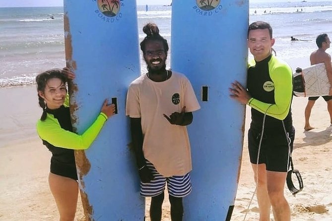 PRIVATE Surf lesson for Beginners Couple - Paddling out and catching your first wave