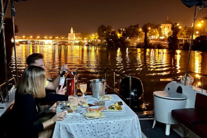 Romantic boat ride 1h (private) - Passing Palacio de San Telmo