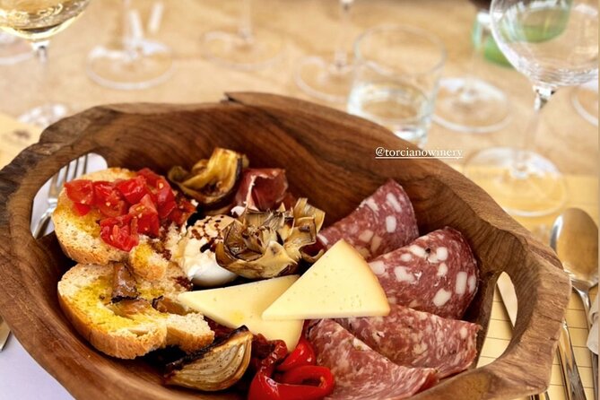 Romantic Dinner and Wine Tasting in San Gimignano Winery - What arrives first: Tuscan appetizers and local products