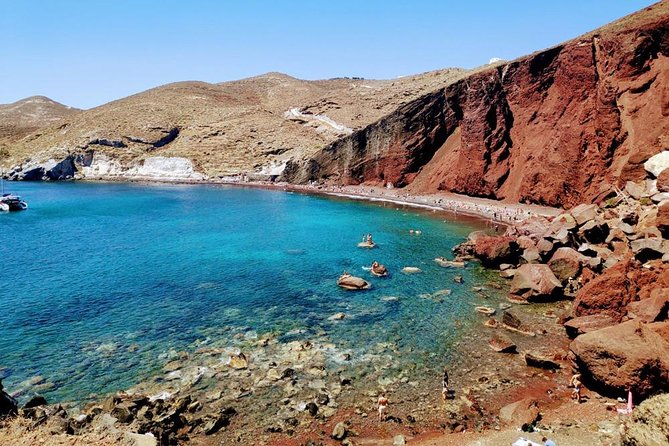 Santorini Private Romantic Tour with Dinner & Wine Tasting - Red Beach: striking volcanic color in 15 minutes