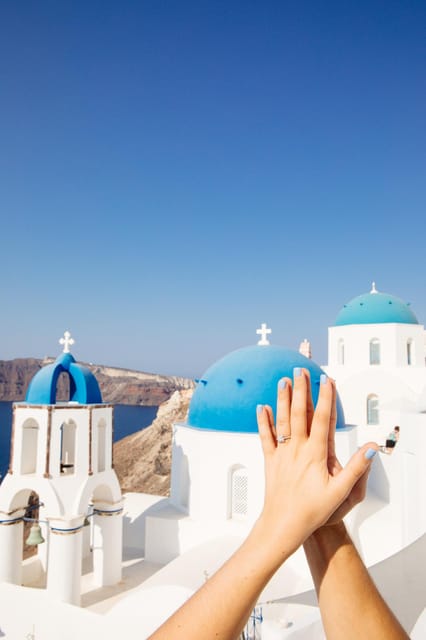 Santorini Proposal: A Luxury Photoshoot for Your Yes! Moment - The value of private photographs at $553