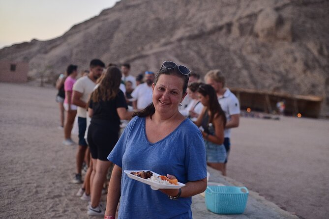 Starwatching, Camel Ride and Romantic Dinner in Hurghada Safari - Climbing for sunset in an open desert setting