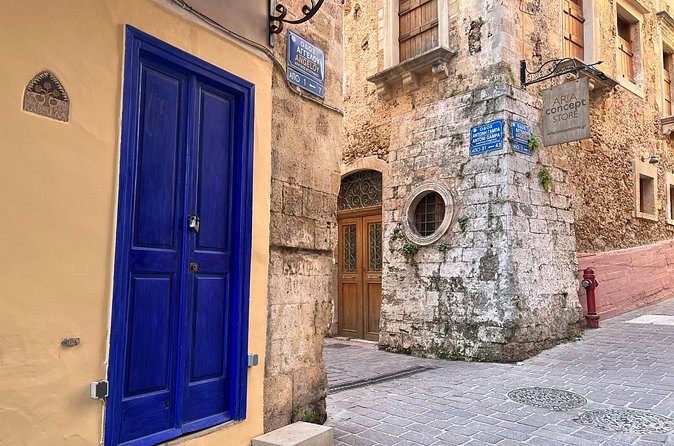 True Love in Chania: Self-Guided Romantic Puzzle Walk - Seeing the Venetian shipyards at Akti Enoseos 9