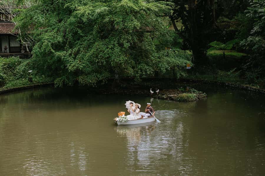 Ubud: Romantic Picnic on a Wooden Boat with Sparkling Wine - A quiet boat setting near Ubud