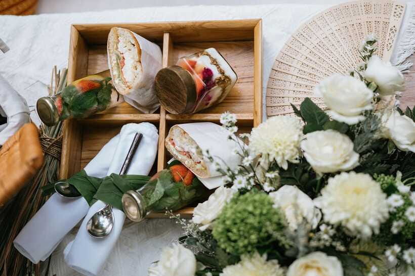 Ubud: Romantic Picnic on a Wooden Boat with Sparkling Wine - Practical clothing and useful items