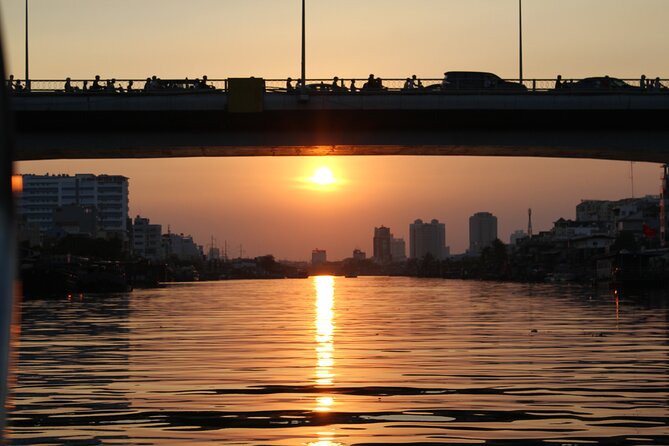 VIP Tour in Saigon: Romantic Sunset Cocktail by SpeedBoat - Bridges, river life, and the changing skyline