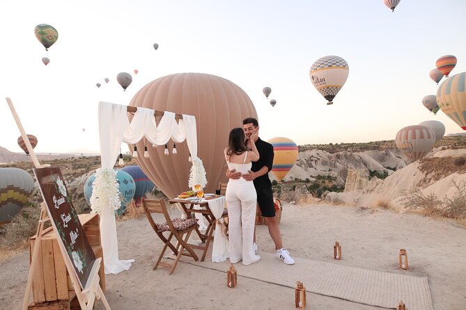 Wedding Proposal and Photoshoot with Hot Air Balloons - The proposal setup, from candles to the Marry Me sign