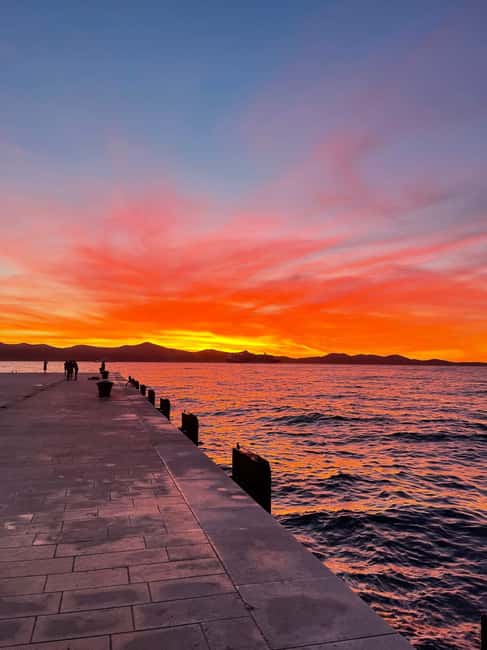 Zadar: Romantic Sunset Boat Tour with Champagne - Passing the Sea Organ as the light fades